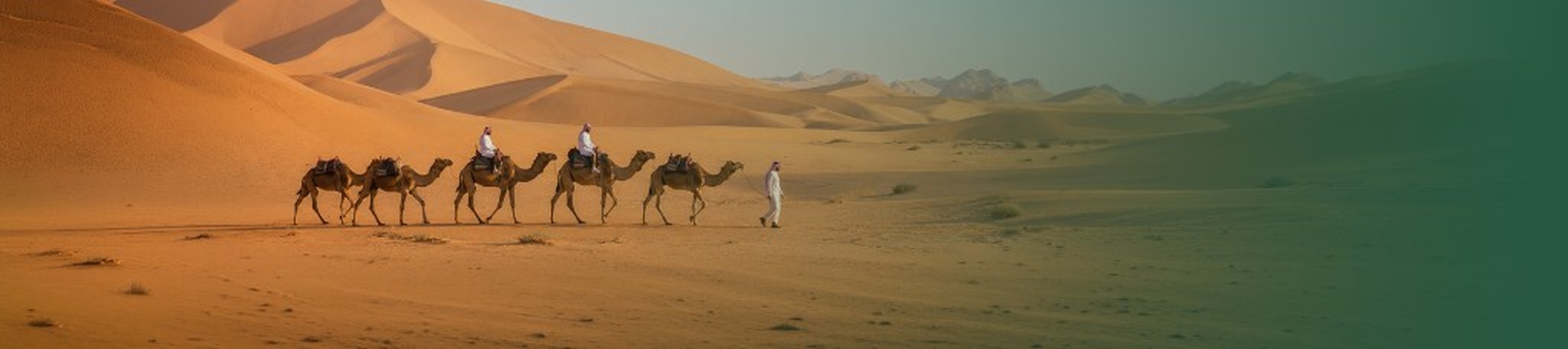 Camel caravan crossing desert dunes on the Ibbil platform